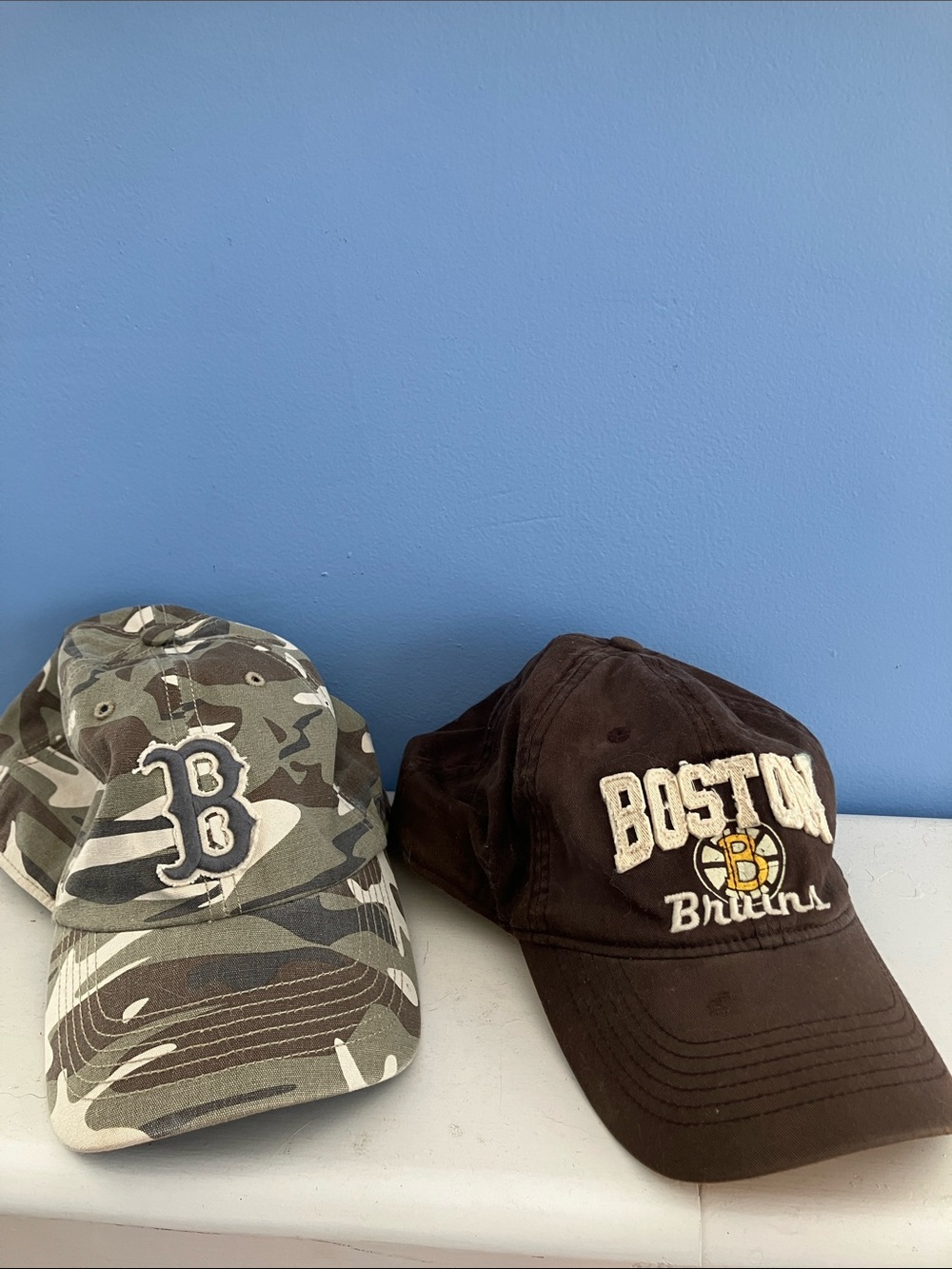 Women’s Brown Boston Bruins and Camo Red Sox Baseball Caps